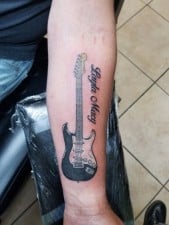 Guitar quote tattoo with meaning